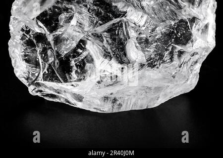 rough diamond, crystal in an allotropic form of carbon, uncut gemstone, concept of luxury or wealth Stock Photo