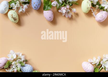 Happy Easter Holidays concept.  Easter eggs and apple tree flowers spring floral background. Spring Religious holiday Easter. Vi Stock Photo