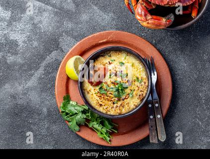 CHILEAN FOOD.  Baked crabmeat crab meat with cheese, cream and bread.  Traditional dish of chilean coast. Pastel o chupe de jaib Stock Photo