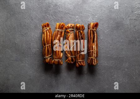 Pacific chilean australian edible dried seaweed COCHAYUYO on concrete gray background Stock Photo