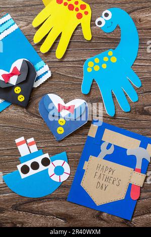 Paper crafts for children. Application of children's creativity.  Kindergarten and craft school. On a beige background, a funny face of a man  made of colored paper. 18906892 Stock Photo at Vecteezy