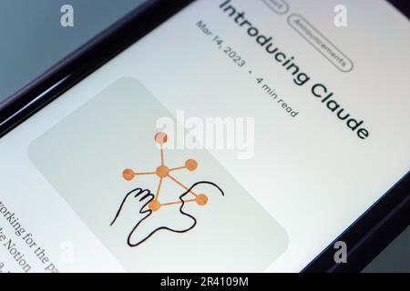 Website of Claude seen in an iPhone screen. Claude AI is a ChatGPT like next-gen AI chatbot assistant produced by AI-driven startup Anthropic. Stock Photo