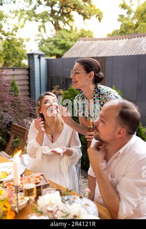 Many people saying cheers and showing their champagne glasses. Wedding party Stock Photo