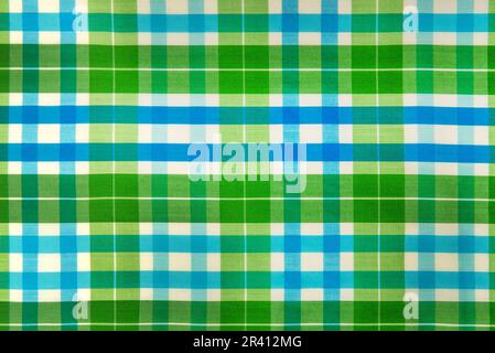 The texture of linen fabric in a large green cell. Scottish tailoring material Stock Photo