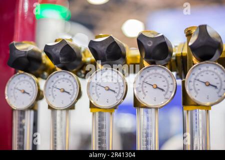 Flowmeter, rotameter - flow regulator for cooling system of injection machine Stock Photo