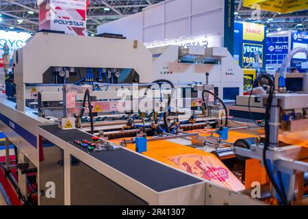 Fully automatic high speed shopping bag making machine at exhibition Stock Photo