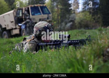 Hohenfels, Germany. 3rd May, 2023. Army Pvt. Tara Ziegler, a field artillery firefinder radar operator assigned to the 2nd Brigade Combat Team, 1st Cavalry Division, provides security during Exercise Combined Resolve 18 at Hohenfels Training Area, Joint Multinational Readiness Center, Germany, May 3, 2023. Combined Resolve 18 is an Army exercise consisting of over 4,000 service members, allies, and partners from 15 countries (Credit Image: © U.S. Army/ZUMA Press Wire Service) EDITORIAL USAGE ONLY! Not for Commercial USAGE! Stock Photo