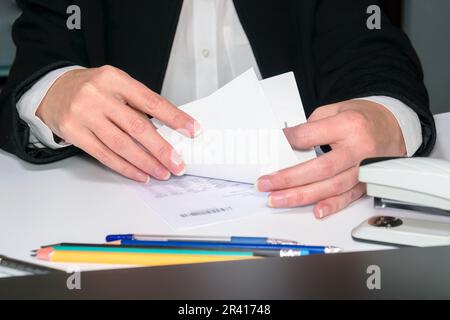 accountant works on a table with papers. financial report calculations in the office Stock Photo