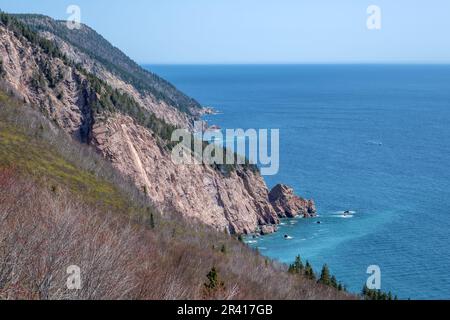 The western coastline of Cape Breton Island as seen from a high vantage point in the Cape Breton Highlands.  The Cabot Trailwinds it's way though the Stock Photo