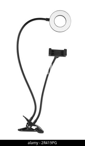 LED ring light on tripod, for selfies and with phone holder, on white background in insulation Stock Photo