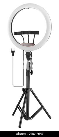 LED ring light on tripod, for selfies and with phone holder, on white background in insulation Stock Photo
