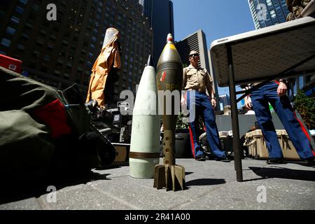 New York City, USA. 25th May, 2023. Memebers of the Chemical Biological Incident Response Force stand near their display during Fleet Week in Times Square on May 25, 2023 in New York City, USA. Each year the US Navy, Marines and the Cost Guard display their assets and engage with the public providing educational and informative details. The several day event is preceded by a Parade of Ships along the Hudson River on the West Side of Manhattan. (Photo by John Lamparski/Sipa USA) Credit: Sipa USA/Alamy Live News Stock Photo