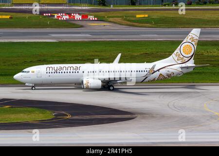 Myanmar National Airlines Boeing 737-800 aircraft Changi Airport in Singapore Stock Photo