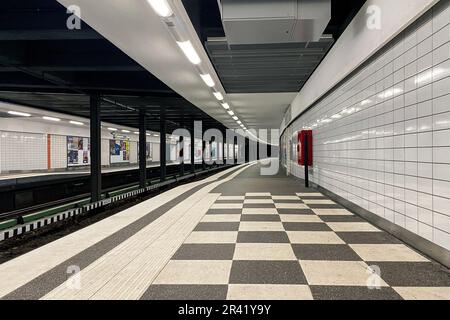 Modern Subway Platform with Checkered Floor and Geometric Design Stock Photo