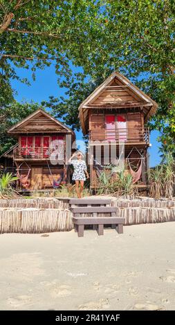 Bamboo hut bungalows on the beach in Thailand Stock Photo