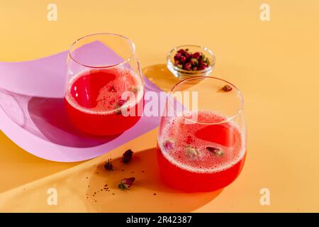 Pink Raspberry Cocktail in drink glass Stock Photo