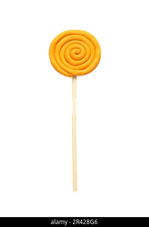 Yellow lollipop made of plasticine isolated on white, top view Stock Photo
