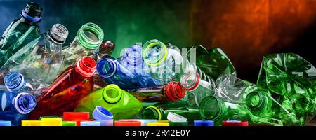 Empty colored drink bottles. Recyclable plastic waste. Stock Photo