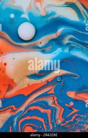Bubble of white in sea of acrylic paint with blue orange and gold abstract oil spill background asset Stock Photo