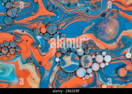 Marble like orbs in abstract acrylic painting with oil background asset Stock Photo