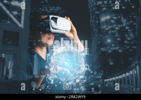 woman wearing VR glasses and accessing Cloud Computing Technology Internet Storage Network Concept And a large database big data Through internet tech Stock Photo