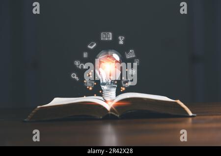 Lightbulb on book with education e-learning icons, Internet education course degree, study knowledge to creative thinking idea and solving solution. E Stock Photo