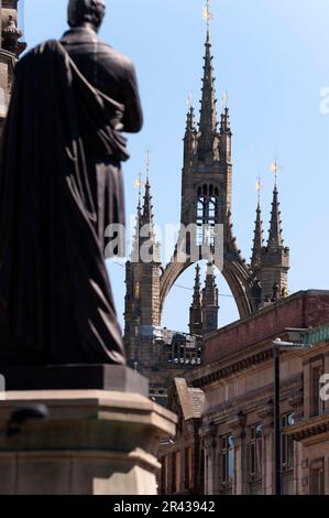 Statue of  George Stephenson with St Nicholas cathedral behind, Newcastle upon Tyne Stock Photo