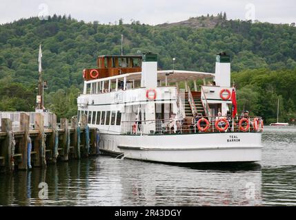 A passenger vessel coming into dock at the jetty, Bowness-on-Windermere, Cumbria, United Kingdom, Europe Stock Photo