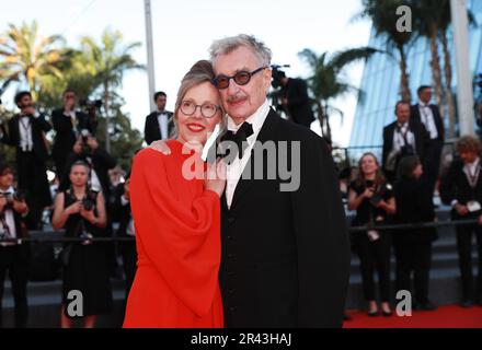 Cannes, France. 25th May, 2023. German director Wim Wenders (R) leaves with his wife German photographer Donata Wenders after the screening of the film 'Perfect Days' during the 76th edition of the Cannes Film Festival in Cannes, southern France, on May 25, 2023. Credit: Gao Jing/Xinhua/Alamy Live News Stock Photo