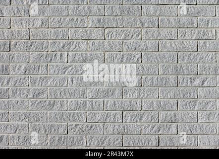 gray clinker brick wall background - modern building exterior with ...