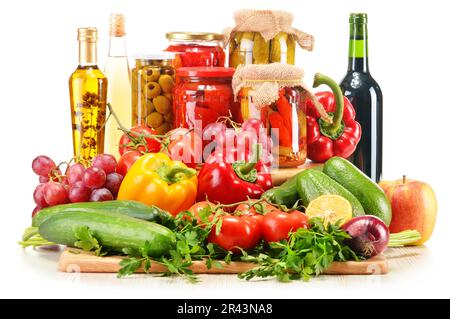 Assorted grocery products including vegetables fruits and wine isolated on white Stock Photo