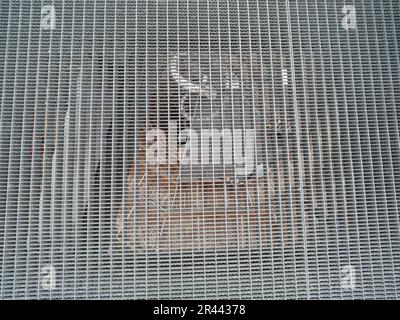 Gray grille transparent floor in platform construction with high resistance to deformation even under high loads Galvanized steel Stock Photo