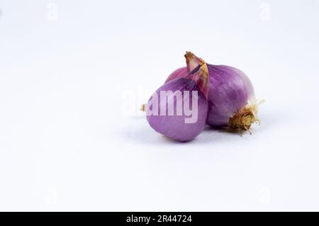 Premium Photo  Red shallots isolated on white background