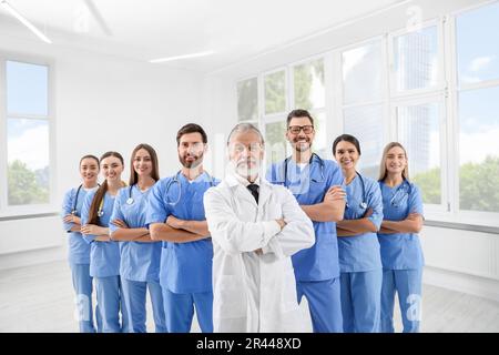 Doctor and his colleagues in hospital. Medical service Stock Photo