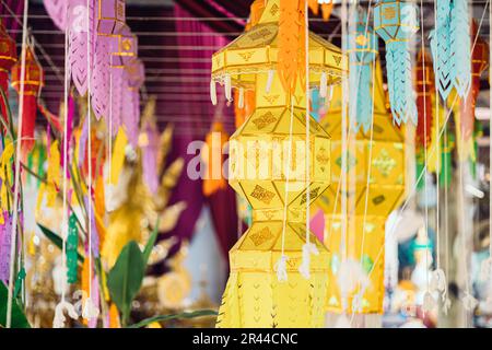 Yipeng Northern Thai culture hanging lantern paper lamp beautiful colorful Lanna traditional festival in temple. Stock Photo