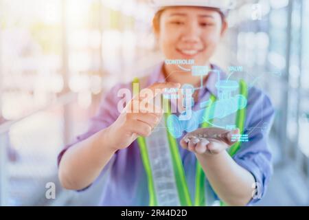 engineer working with modern technology hologram graphic 3d pipe design model overlay in hand palm Stock Photo