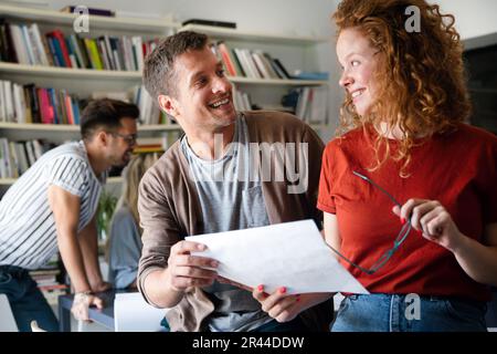 Group of successful happy multiethnic business people working as a team in office on meeting. Stock Photo