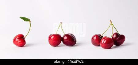 Healthy red cherries isolated on white background. Set of cherries, red fruits Stock Photo