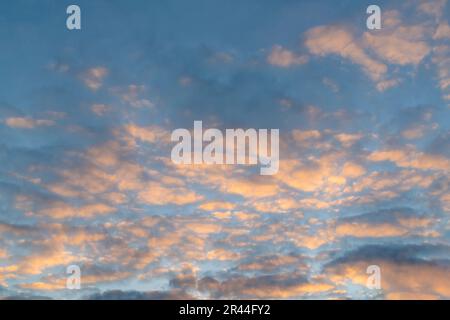Light orange beautiful clouds with blues sky Stock Photo