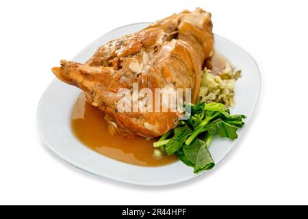 Die cut of Close up of chinese food pork knuckle in a plate on white isolated. Stock Photo