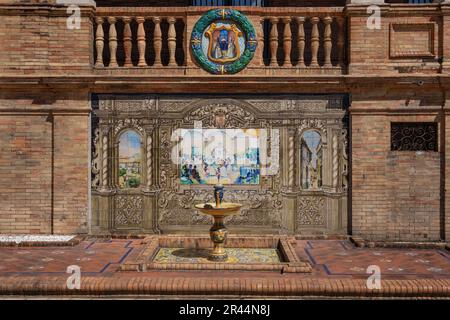 Alcove with fountain and tiles representing Seville Province - Seville, Andalusia, Spain Stock Photo