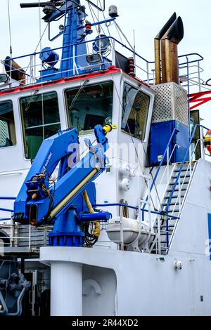 Stavanger, Rogaland, Norway, May 19 2023, Blue Work or Tug Boat Vessel Moored Stavanger Harbour With No People Stock Photo