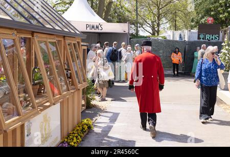 A Chelsea Pensioner, or British Army veteran in uniform at the Chelsea Flower Show 2023, Chelsea London UK Stock Photo