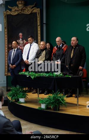 26 May 2023, Baden-Württemberg, Mannheim: The Maori delegation during the event, front row l-r: Te Arikirangi Mamaku-Ironside (Repatriation Programme Coordinator, Karanga Aotearoa Repatriation Programme), Chas Taurima, Te Herekiekie Haerehuka Herewini (Head of Repatriation, Karanga Aotearoa Repatriation Programme), Craig Hawke (New Zealand's Ambassador to Germany) and Paraone Gloyne standing during the handover ceremony at the Museum Zeughaus for the repatriation of the Toi Moko to New Zealand. Three mummified heads of New Zealand Maori are in the ethnological collections of the Reiss-Engelhor Stock Photo