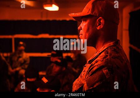 Recruits participate in Battle Stations inside USS Trayer (BST 21) at Recruit Training Command (RTC). Trayer, more commonly referred to as 'Battle Stations,' is the crucible event that recruits must pass prior to graduation, testing their knowledge and skills in basic seamanship, damage control, firefighting and emergency response procedures. Boot camp is approximately 10 weeks and all enlistees into the U.S. Navy begin their careers at the command. Training includes five warfighting competencies of firefighting, damage control, seamanship, watchstanding, and small arms handling and marksmansh Stock Photo