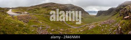 A scenic Bealach na Ba road winding through the mountains in Scotland Stock Photo