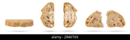 Set of slices of fresh Ciabatta bread on a white isolated background. Slices hang or fall on a white background. The concept of Italian bread baking Stock Photo