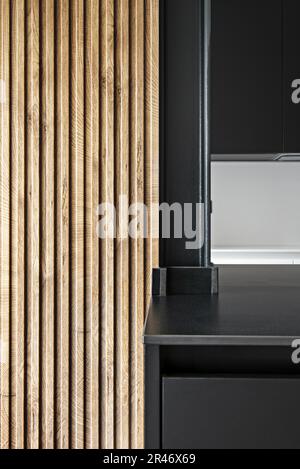 Wood, metal and stone textures in the kitchen of a modern house Stock Photo