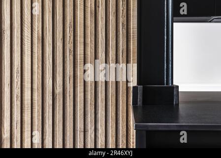 Root wood, metal and stone textures in the kitchen of a modern house Stock Photo