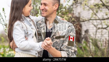 Flag of Canada on military uniform. Canadian soldiers. Army of Canada. Remembrance Day. Canada Day Stock Photo
